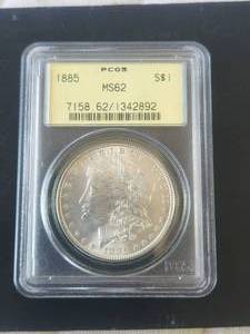 lot 115 image: 1885 Morgan Silver Dollar - PCGS MS62