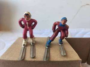 lot 138 image: Vintage pair of Barclay - man and woman skiing