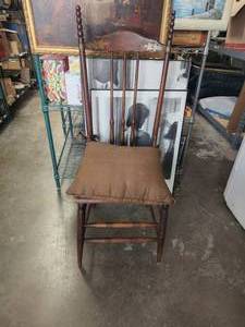 lot 152 image: Vintage high back chair with brass decorative pieces