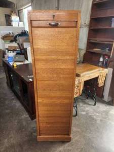 lot 230 image: Locking cabinet with roll top door - has key