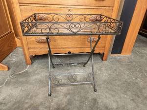 lot 234 image: Small iron table with glass bottom