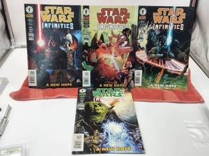 lot 98 image: Selection of 1,2,3, and 4 Star Wars Infinities comics