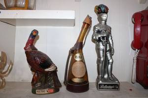 lot 13 image: Wild Turkey Bottle, Dickel Tennessee, and Ballantines Whiskey Souvenir Bottles