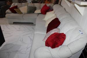 lot 15 image: 2-Piece L-Shaped Sectional Couch 39D x 79W and 39D x 93W Pillows Included