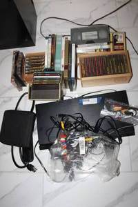 lot 51 image: Blu-ray Player, CDs, Tapes, DVDs, and Power Cord