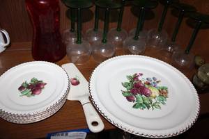 lot 59 image: Green Stemmed Goblet Glass Set, Red Decanter, Berries Plate Set marked The Harker Pottery Co. 22 KT. Gold