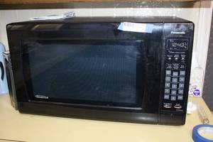 lot 75 image: Panasonic Microwave Model NN-SN942B