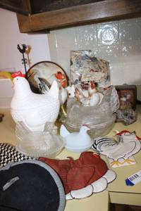 lot 97 image: Lidded Glass Chicken Dishes, Apron, and Ceramic Chicken Figurines