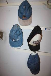 lot 141 image: Denim Souvenir Ball Caps and 2010 Texas Rangers League Champs Cap
