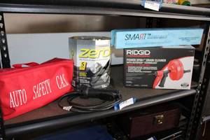 lot 218 image: Car Safety Bag, Zero-G Garden Hose, Rearview Mirror, and Ridgid Power Spin Drain Cleaner