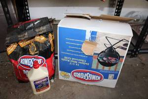 lot 227 image: Unwrapped Mini Charcoal Grill, Charcoal Briquets, and Light Fluid