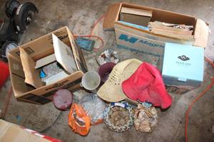 lot 239 image: Decorative Rocks and Shells, Floppy Hats, Ceramic Funseeker Lady, and Magazines