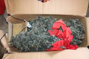 lot 240 image: 4.5 Ft. Lighted Pine Tree in Decorative Pot