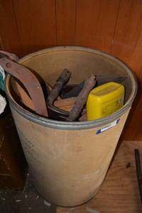 lot 280 image: Trash Barrel and Scrap Wood Pieces