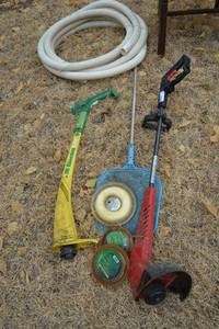 lot 263 image: Toro Trimmer and Edger, Weed Eater Line, ElectraLite Weed Eater, Pool Tubing and Hand-held Skimmer