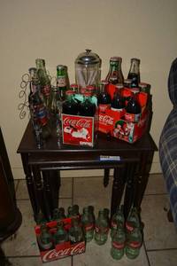 lot 45 image: Coca-Cola Lot Unopened Coke Bottles, also Mt. Dew and Pepsi, Bottle Opener, Straw Cannister, and Empty Bottles