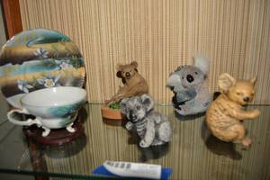 lot 27 image: Koala Figurines and Hand Painted Cup and Saucer Set marked Norcrest Fine China