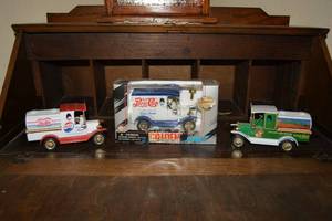 lot 35 image: Pepsi and Mt. Dew Plastic and Die Cast Delivery Truck Coin Banks