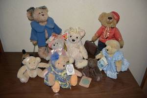 lot 232 image: Muffy VanderBears, Dog Walker Bear, Vintage Bellhop Bear, and Bearington Bear