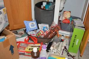 lot 61 image: Bathroom Lot Curling Irons, Hairdryer, Band-aids, Irons, and More