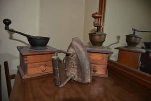 lot 73 image: Antique sad Iron and Vintage Coffee Grinders