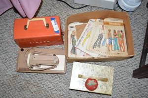 lot 91 image: Vintage Sewhandy Sewing Machine, Patterns, and Sewing Box