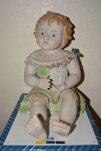lot 97 image: Heubach German Bisque Porcelain Piano Baby
