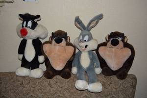 lot 98 image: Plush Bugs Bunny, Sylvester, and Taz Dolls