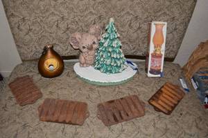 lot 102 image: Cast Iron Cornbread Molds, Chicken Gourd Birdhouse, and World Map Kerosene Hurricane Lamp