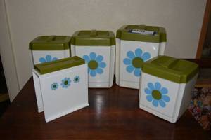 lot 114 image: Vintage Plastic Cannister Set and Napkin Holder in Blue and Green Flower Motif