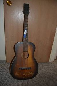 lot 131 image: Vintage Red Foley Signature Smooth Trailin Guitar