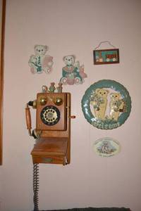 lot 209 image: Wooden Vintage Style Wall Phone and Bear Dcor