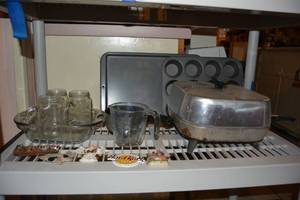 lot 294 image: Electric Skillet, Baking Pans, 8x8 Glass Baking Dish, Measuring Cup, and Frig Magnets