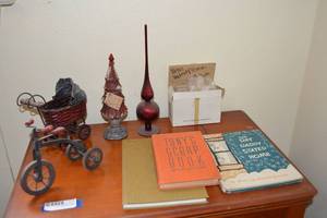 lot 155 image: Doll Size Stroller and Tricycle, Bear Nativity Scene, Vintage Books (1944-45 Tonys Scrap Book, The Day Daddy Stayed Home, and John Muirs Wild America)