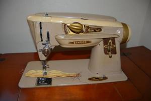 lot 156 image: Vintage Singer Sewing Machine and Table Model 500A Plus Bench and Foot Stool, 27.5W x 18D x 31.5H
