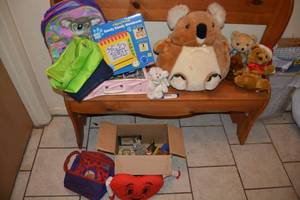 lot 184 image: Kids Lot Handy Dandy Notebook, Plush Bears, SweatPant Size 6-7, Lunch Bags, Koala Backpack, Snow globe and Music Box Figurine