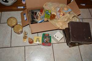 lot 307 image: Misc. Lot Vintage Bongos, Slide Carousel Trays, Handsewn Doll Hats, Musical Jewelry Box