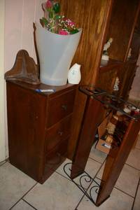 lot 322 image: Narrow 3-Drawer Cabinet, Wire and Wood Shelf Unit, Trash Bin, Vase with Roses, and Air Freshener