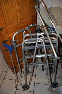 lot 321 image: Folding Walkers, Canes, Grabber, Stand Alone Handicap Bar Assist, and Blankets