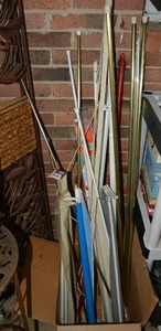 lot 344 image: Curtain Rods, Candy Cane Banner, and Carpet Bars