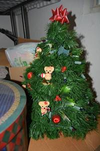 lot 352 image: Christmas Wreaths, Small Tree, Round Gift Box, Ceramic Figurines, and Christmas Lights