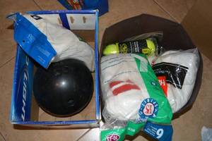lot 366 image: Unopened Packages of Mens Socks, Tennis Balls and Bowling Ball