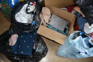lot 369 image: Large amount of Clothes with Checkered Slippers