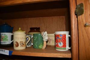lot 413 image: Misc. Glassware Red Bubble Depression Glass Plate, Corn Teapot, Blue Camping Coffee Pot, Brown Jug and More