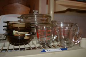 lot 427 image: Pyrex Measuring Cups, Clear Baking Casserole Dishes, and Brown Individual Dishes