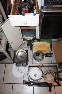 lot 207 image: Kitchen Lot Carvel Hall Carving Knife, Can Openers, Baking Pans, Sauce Pans, Skillets, and More