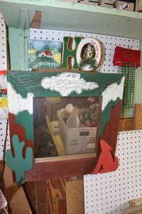 lot 561 image: Handmade Mirror with Wolf and Cactus Embellishments, HO Christmas Decoration and Bead Garland