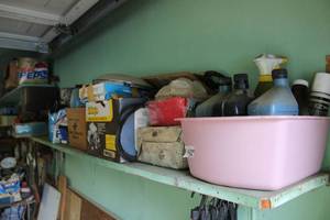 lot 548 image: Automotive Lot Oil, Carburetor, Belt, Hubcap, and Trap Straps