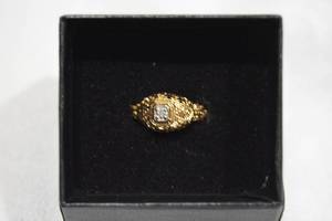 lot 637 image: Sterling Silver vermeil (gold over silver) diamond solitaire ring. Marked 925 FISS. Diamond tested. Size 7