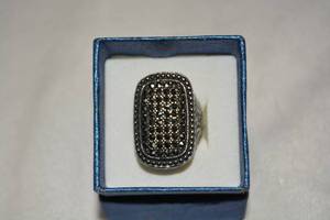 lot 624 image: Polished Stainless Steel marcasite high table statement ring. Marked 316L S Steel. Size 9